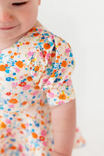 Load image into Gallery viewer, Puff Skirted Leo in Summer Blooms
